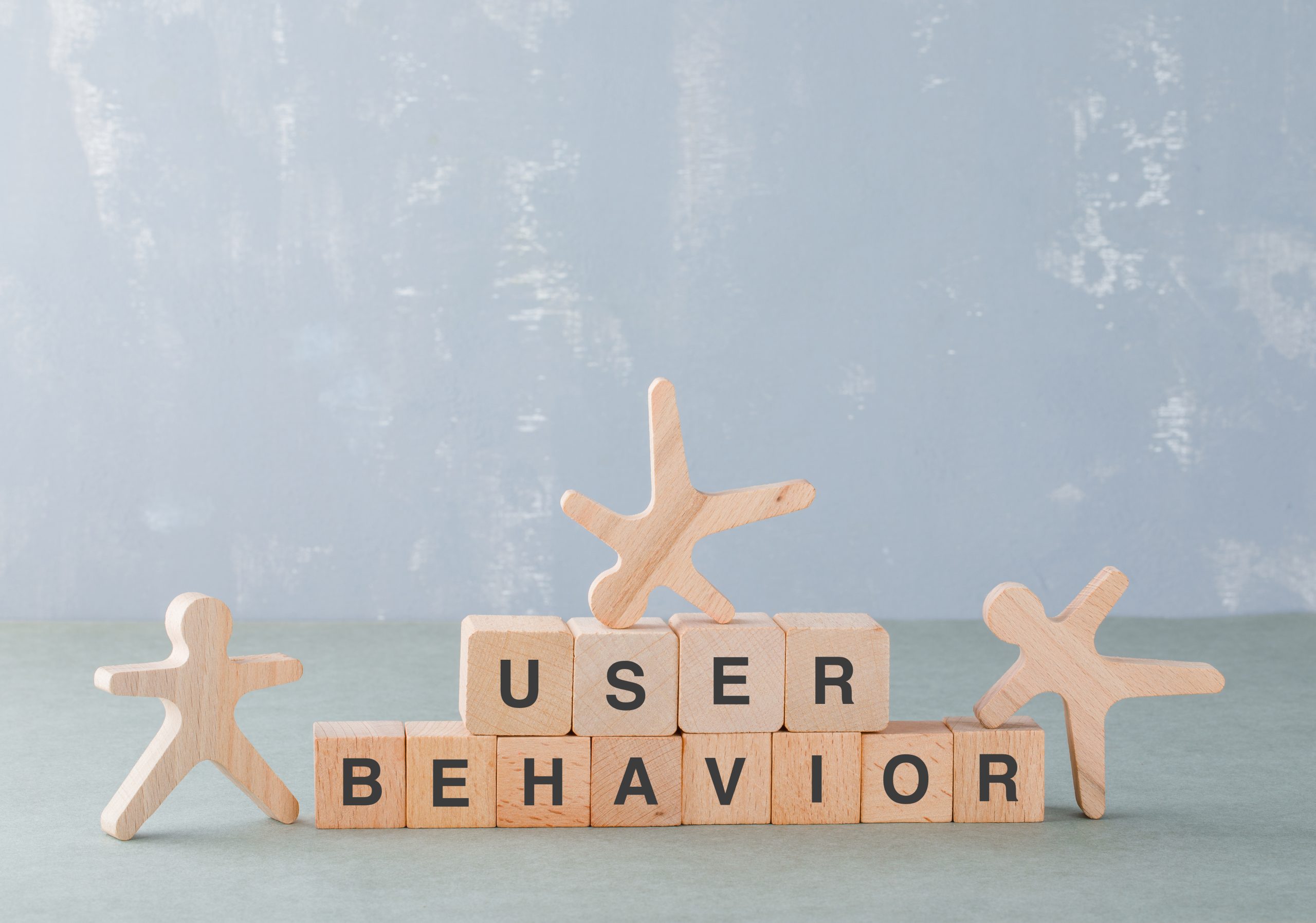 User experience and behaviour concept written scrabble letters