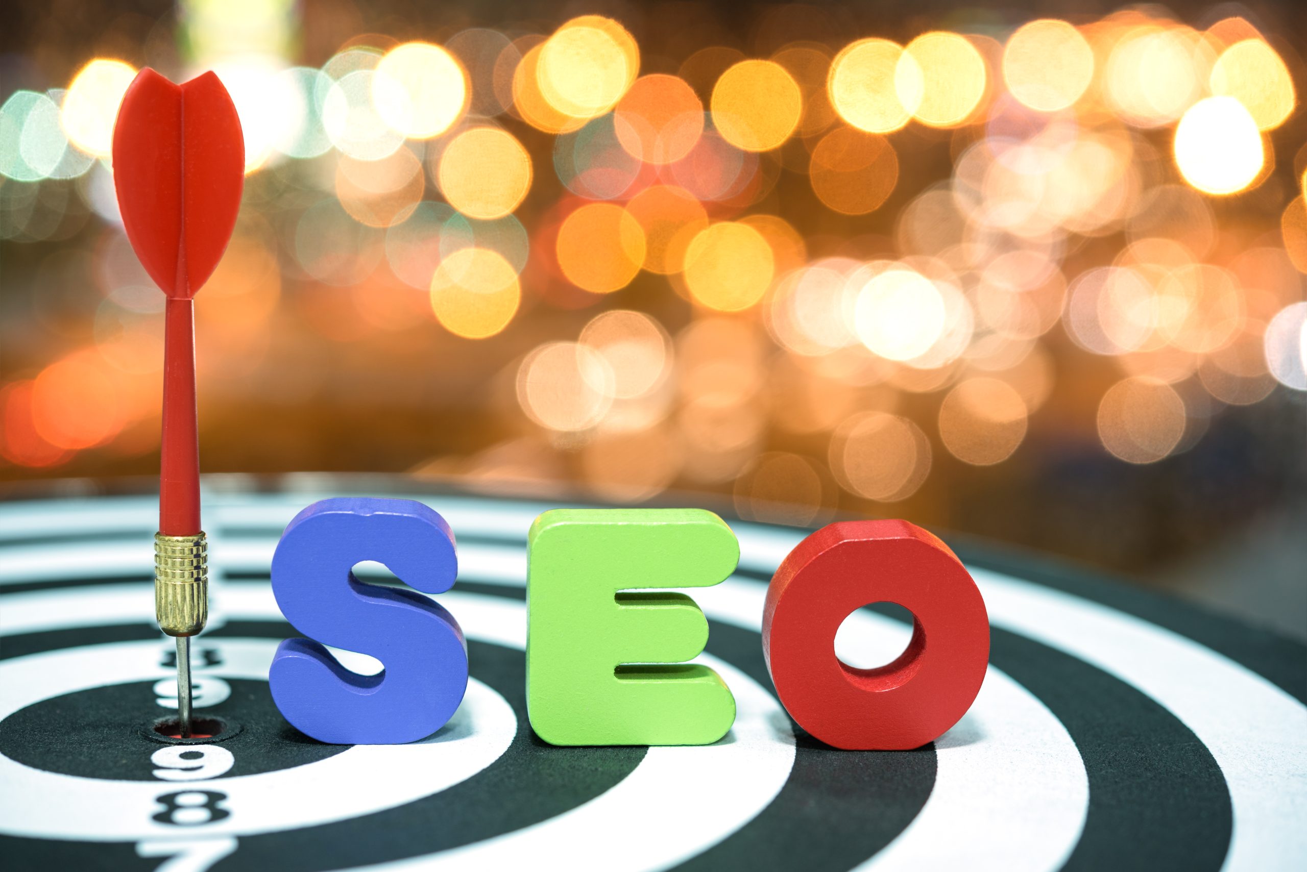 An SEO graphic with a dart on the board