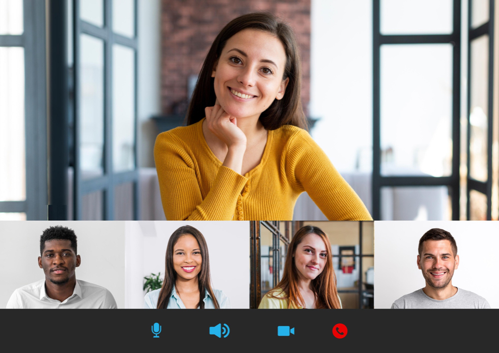 A businesswoman dressed in yellow shirt, joining some online communities for SEO backlinking, via Skype conference call.