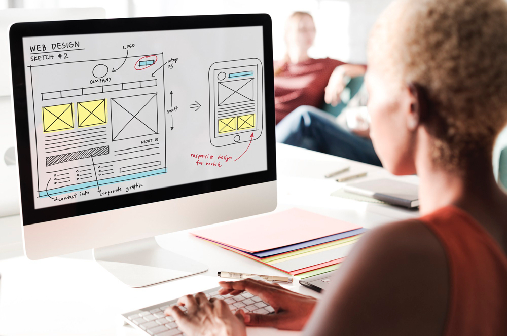 A web designer, planning a meta tags layout for a business website.